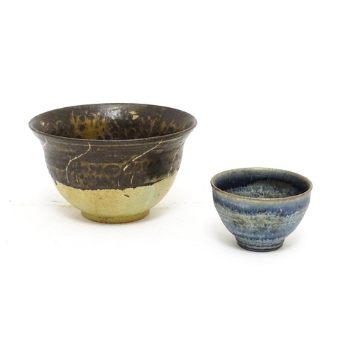 112 - A studio pottery two tone bowl with drip detail. Together with a small studio pottery bowl with a mo... 