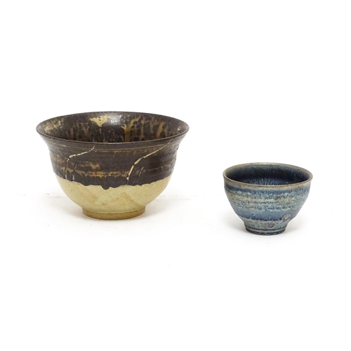 112 - A studio pottery two tone bowl with drip detail. Together with a small studio pottery bowl with a mo... 