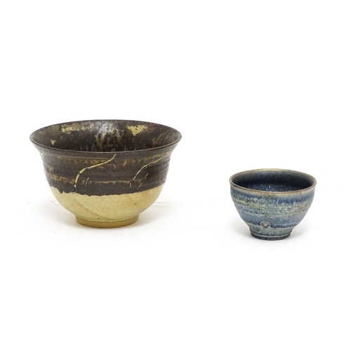 112 - A studio pottery two tone bowl with drip detail. Together with a small studio pottery bowl with a mo... 