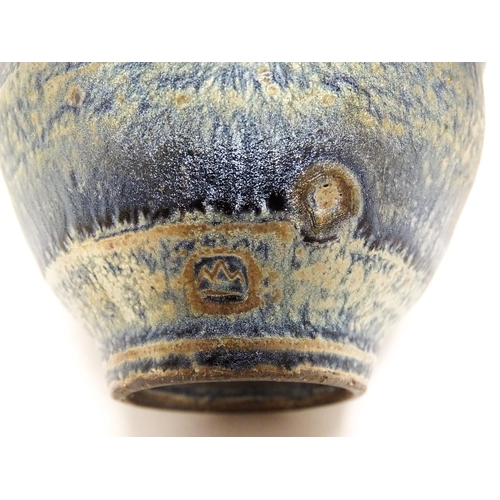 112 - A studio pottery two tone bowl with drip detail. Together with a small studio pottery bowl with a mo... 