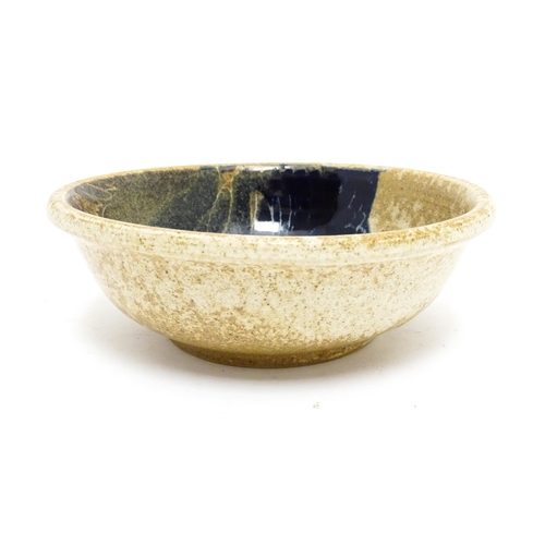 112A - A Crick Pottery studio pottery bowl by Diana Worthy. Signed under with incised CP mark. Approx. 2 1/... 