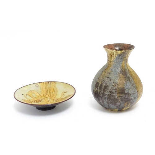 115 - Two items of studio pottery comprising a Chelsea Pottery plate with wheat detail by Hazel Levy, and ... 