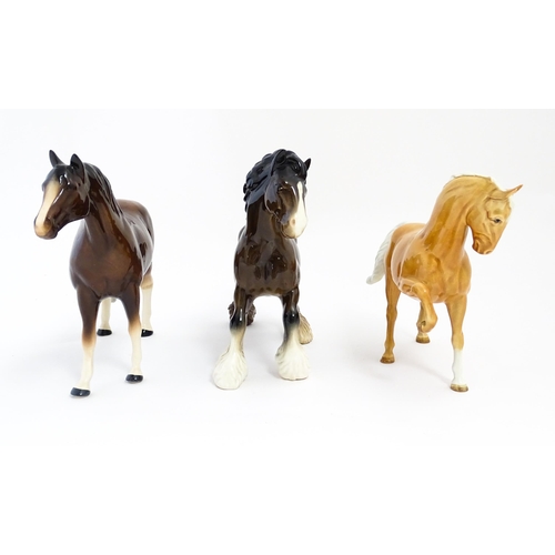 129 - Two Beswick models of horses comprising a palomino Prancing Arab model no. 1261, and a brown canteri... 