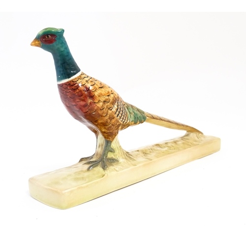 132 - A Beswick model of a pheasant model no. 1774. Marked under. Approx. 8 1/2