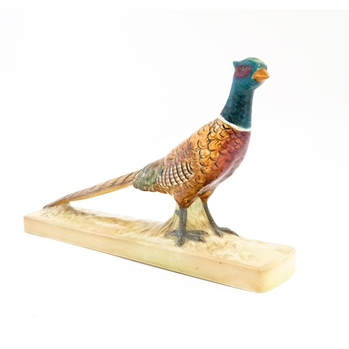 132 - A Beswick model of a pheasant model no. 1774. Marked under. Approx. 8 1/2