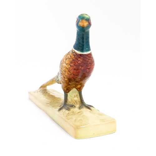 132 - A Beswick model of a pheasant model no. 1774. Marked under. Approx. 8 1/2