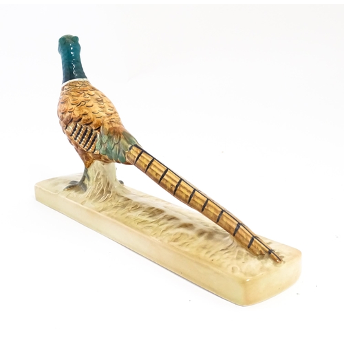 132 - A Beswick model of a pheasant model no. 1774. Marked under. Approx. 8 1/2