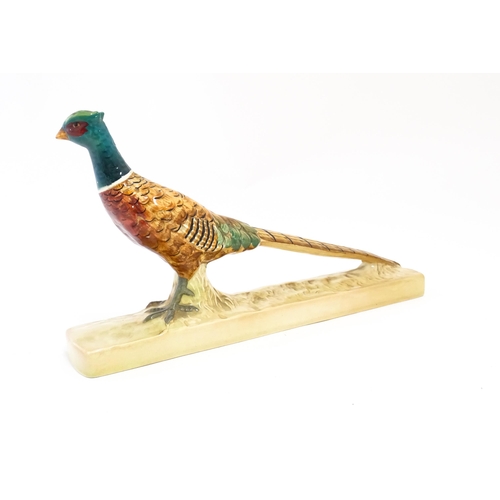 132 - A Beswick model of a pheasant model no. 1774. Marked under. Approx. 8 1/2