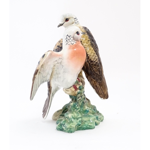 134 - A Beswick model of two turtle doves model no. 1022. Approx. 7 3/4