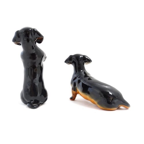 136 - Two Beswick models of Dachshund dogs model no. 1460 & 1461. Largest approx. 4