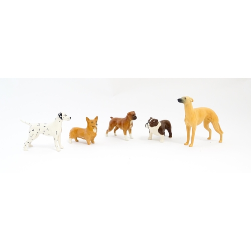 137 - Five Beswick models of dogs comprising Corgi no. 1736, Whippet no. 1786B, Dalmatian no. 961, Bulldog... 