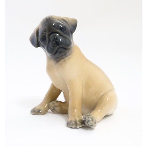 138 - A Royal Copenhagen model of a Pug dog, model no. 3169. Approx. 3 1/4