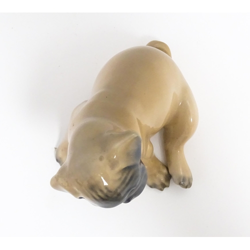 138 - A Royal Copenhagen model of a Pug dog, model no. 3169. Approx. 3 1/4