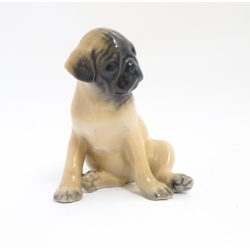 138 - A Royal Copenhagen model of a Pug dog, model no. 3169. Approx. 3 1/4