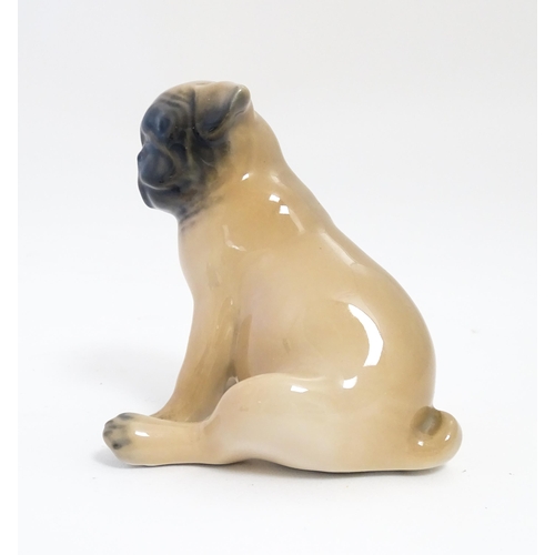 138 - A Royal Copenhagen model of a Pug dog, model no. 3169. Approx. 3 1/4