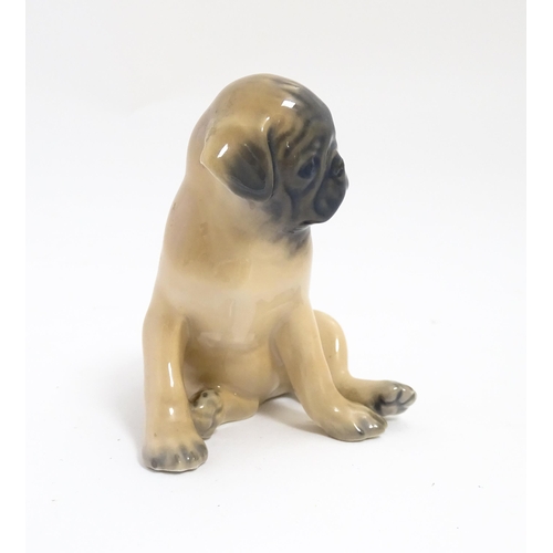 138 - A Royal Copenhagen model of a Pug dog, model no. 3169. Approx. 3 1/4