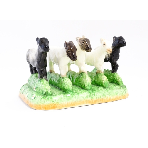 140A - A Border Fine Arts James Herriot Country Kitchen Collection ceramic toast rack modelled as lambs, ti... 