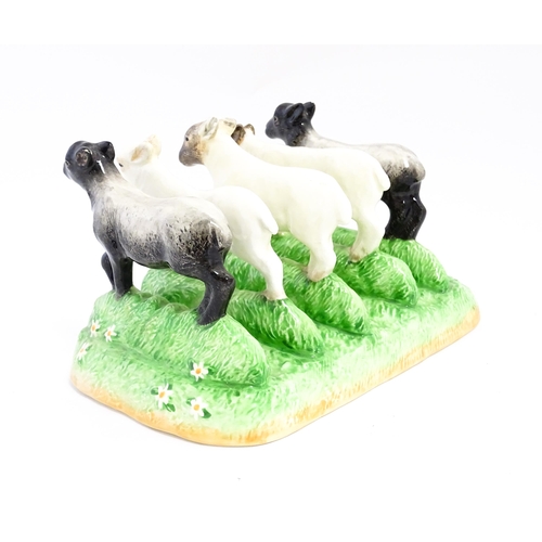 140A - A Border Fine Arts James Herriot Country Kitchen Collection ceramic toast rack modelled as lambs, ti... 