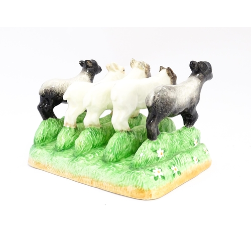 140A - A Border Fine Arts James Herriot Country Kitchen Collection ceramic toast rack modelled as lambs, ti... 