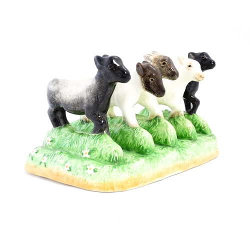 140A - A Border Fine Arts James Herriot Country Kitchen Collection ceramic toast rack modelled as lambs, ti... 