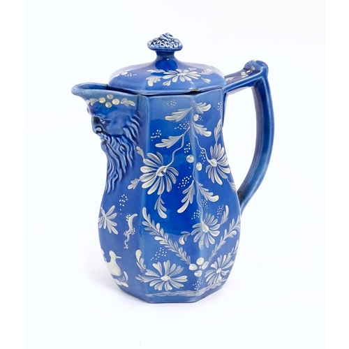 147 - A 19thC Spode coffee pot with relief mask detail to spout with hand painted floral and bird detail. ... 