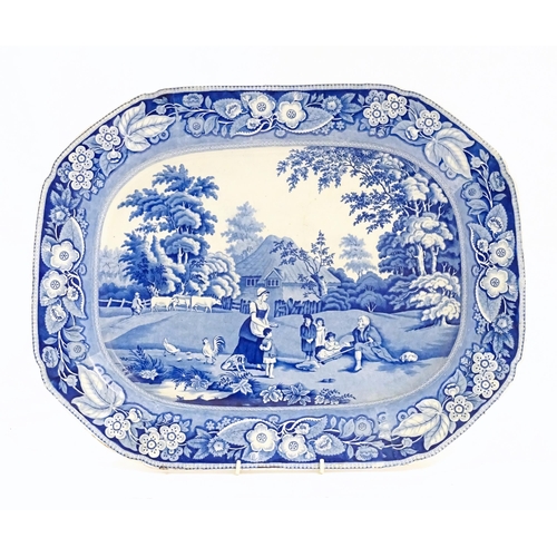 162 - A blue and white meat plate decorated in the Hospitality pattern. Approx. 16 1/2