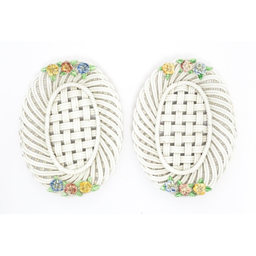 66 - A pair of 19thC cream dishes of basket weave form with applied floral and foliate detail. Approx. 10... 