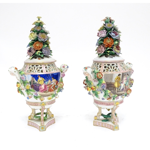 86 - A pair of Dresden Carl Thieme Potschappel pot pourri urns and covers with twin maiden head handles, ... 