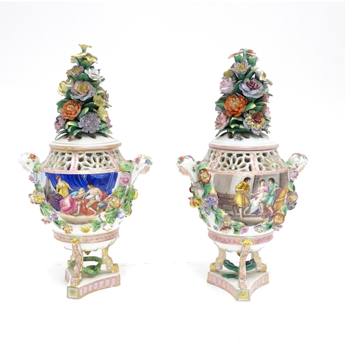 86 - A pair of Dresden Carl Thieme Potschappel pot pourri urns and covers with twin maiden head handles, ... 