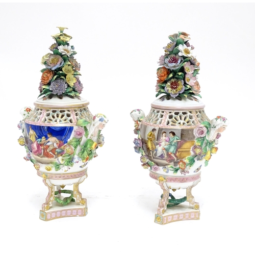 86 - A pair of Dresden Carl Thieme Potschappel pot pourri urns and covers with twin maiden head handles, ... 