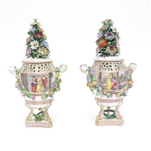 86 - A pair of Dresden Carl Thieme Potschappel pot pourri urns and covers with twin maiden head handles, ... 