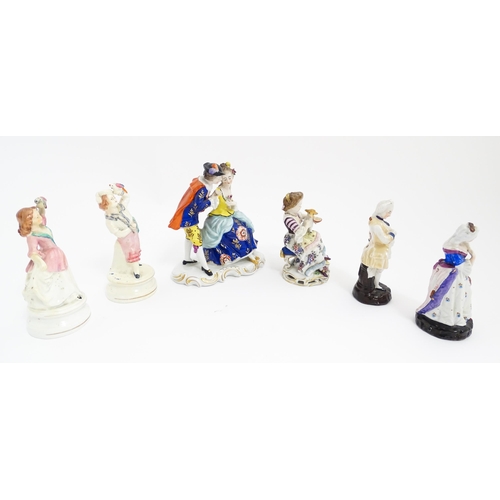 183 - A quantity of Continental figures to include a figural group modelled as a couple in the manner of S... 