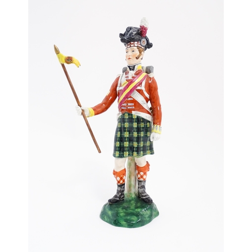 185 - A Copeland figure modelled as a Gordon Highlanders soldier, retailed by T. Goode & Co. Approx. 11