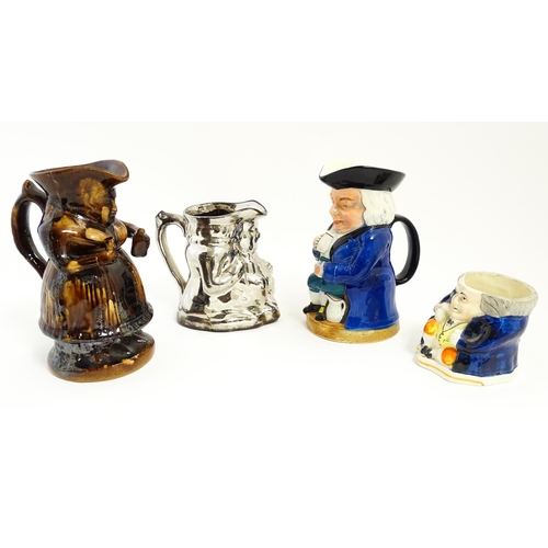 195 - Three assorted Toby / character jugs to include a treacle glaze example, a lustre jug, and a musical... 