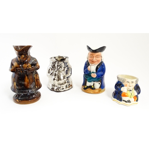 195 - Three assorted Toby / character jugs to include a treacle glaze example, a lustre jug, and a musical... 