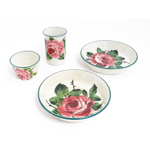 196 - Four items of Wemyss pottery decorated in the cabbage rose pattern comprising vase, pot and two dish... 