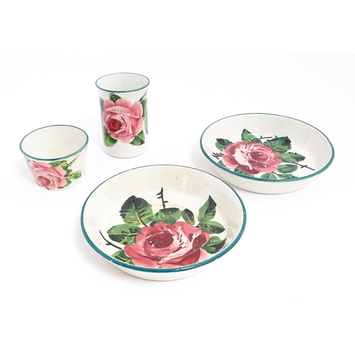 196 - Four items of Wemyss pottery decorated in the cabbage rose pattern comprising vase, pot and two dish... 