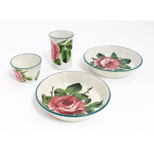 196 - Four items of Wemyss pottery decorated in the cabbage rose pattern comprising vase, pot and two dish... 