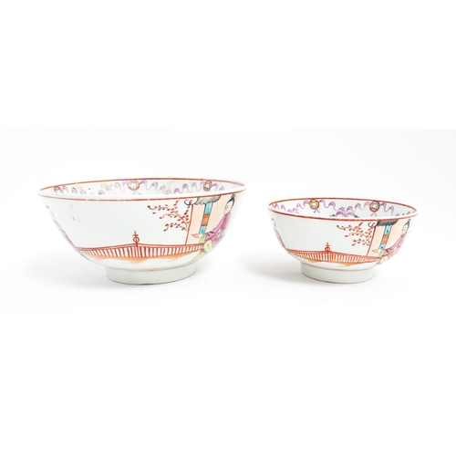 198 - Two New Hall style bowls with chinoiserie decoration depicting figures on a terrace, with swag and b... 