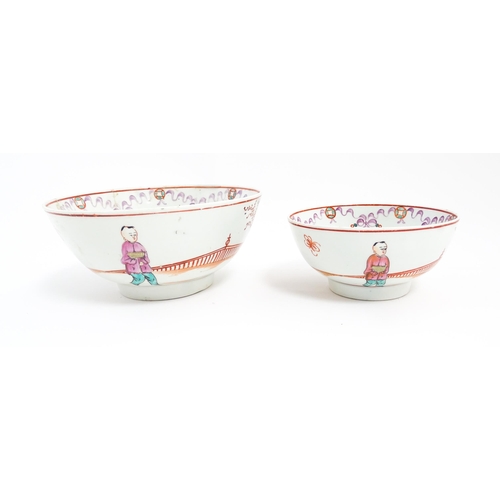 198 - Two New Hall style bowls with chinoiserie decoration depicting figures on a terrace, with swag and b... 