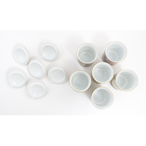 206 - Assorted ceramics to include a pair of Copeland Spode saucers, six Japanese pot and covers, a twin h... 