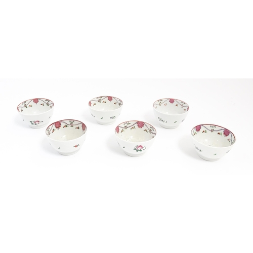 208 - Six New Hall style tea bowls and saucers decorated with flowers and swag detail. Saucers approx. 5 1... 