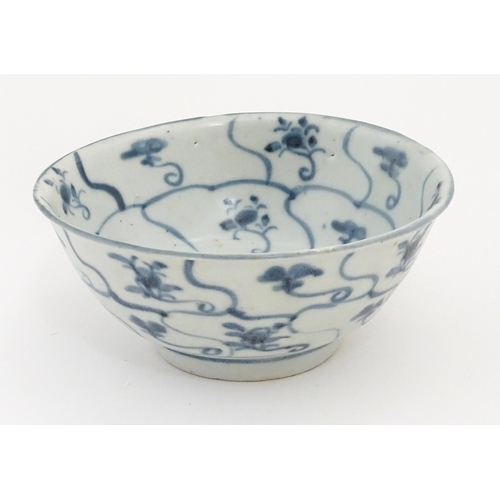 11 - A Chinese blue and white Tek Sing bowl decorated with stylised floral motifs. Bearing Nagel Tek Sing... 