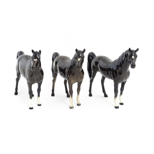 126 - Three Beswick models of dark brown Arab horses. Approx. 6