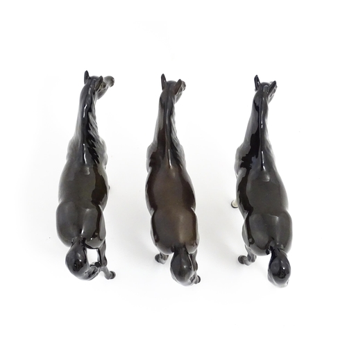 126 - Three Beswick models of dark brown Arab horses. Approx. 6