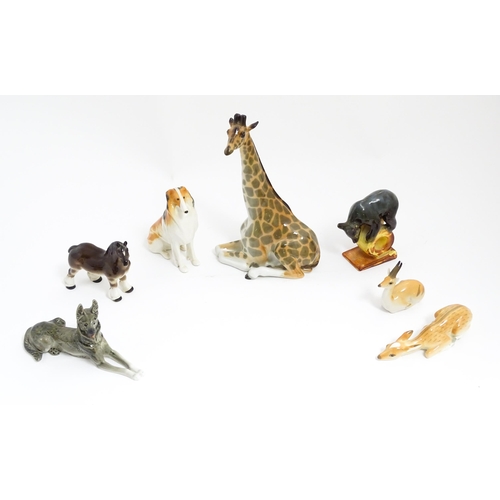 164 - A quantity of assorted Russian ceramic models of animals to include giraffe, horse, bear, deer, dog,... 