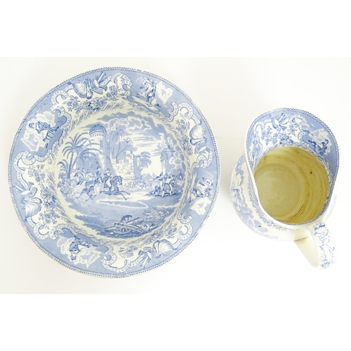 166 - A Victorian blue and white bowl and ewer decorated in the pattern Napoleon. Bowl approx. 4 1/2