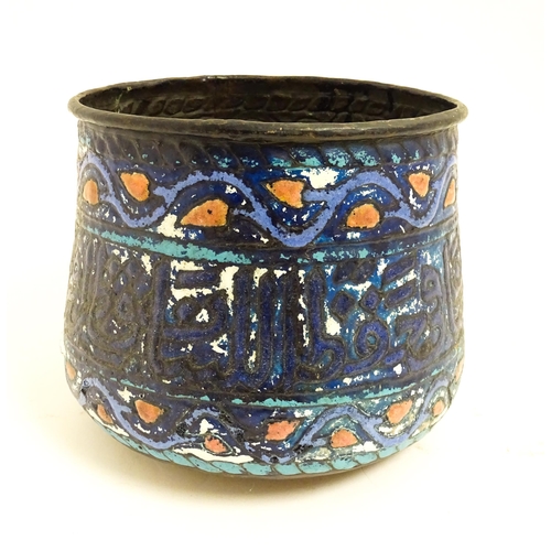 1083 - An Islamic copper planter with banded enamel decoration. Approx. 7 1/2