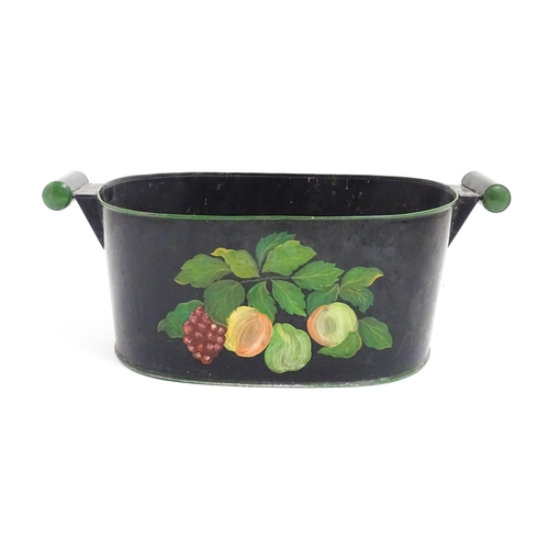 1085 - A Victorian toleware planter with twin handles and hand painted fruit and vine decoration. Approx. 8... 