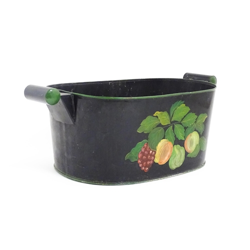 1085 - A Victorian toleware planter with twin handles and hand painted fruit and vine decoration. Approx. 8... 